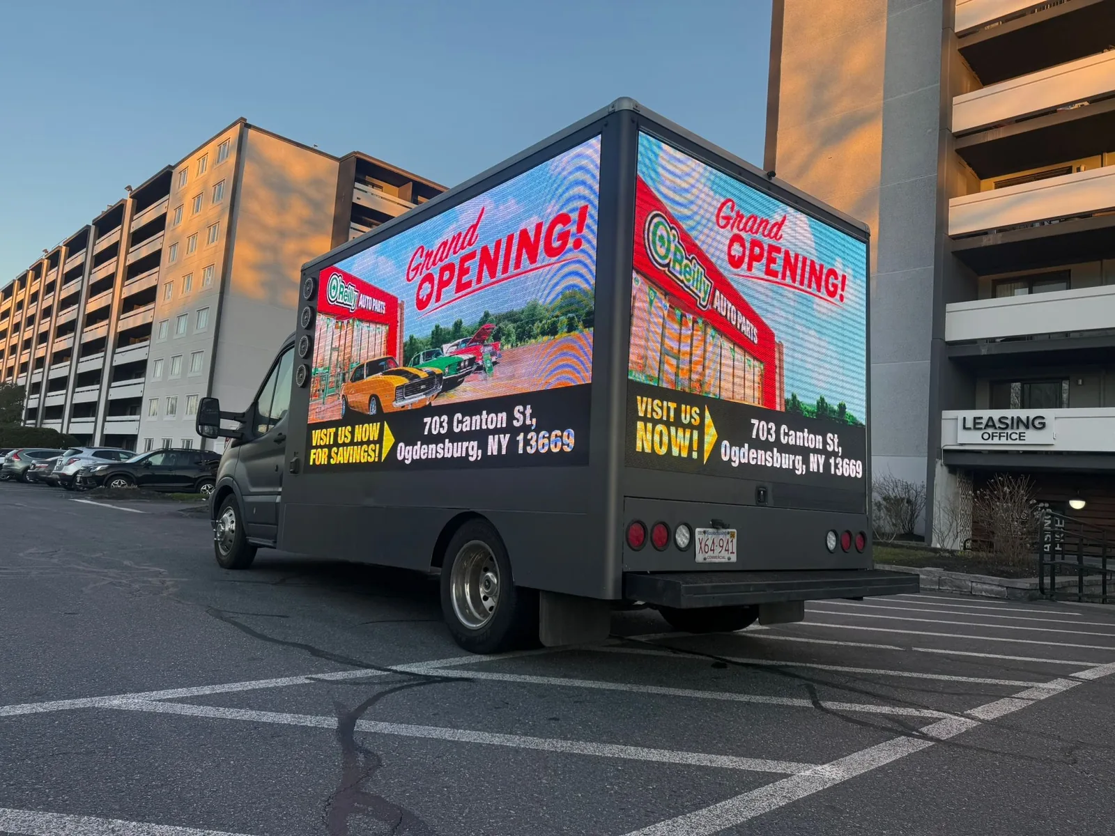 2018 Ford Transit 350 HD LED billboard truck for sale running a live grand opening ad campaign