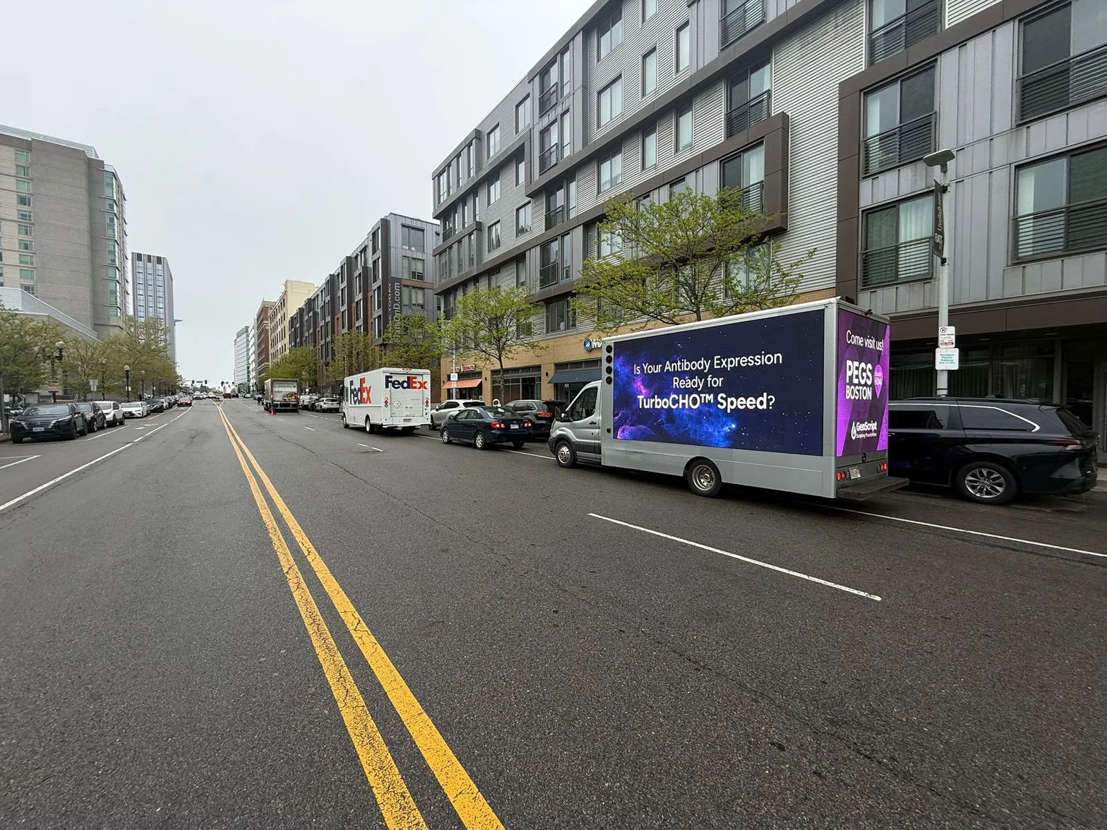 2018 LED billboard truck for sale running a live client ad campaign on a city street