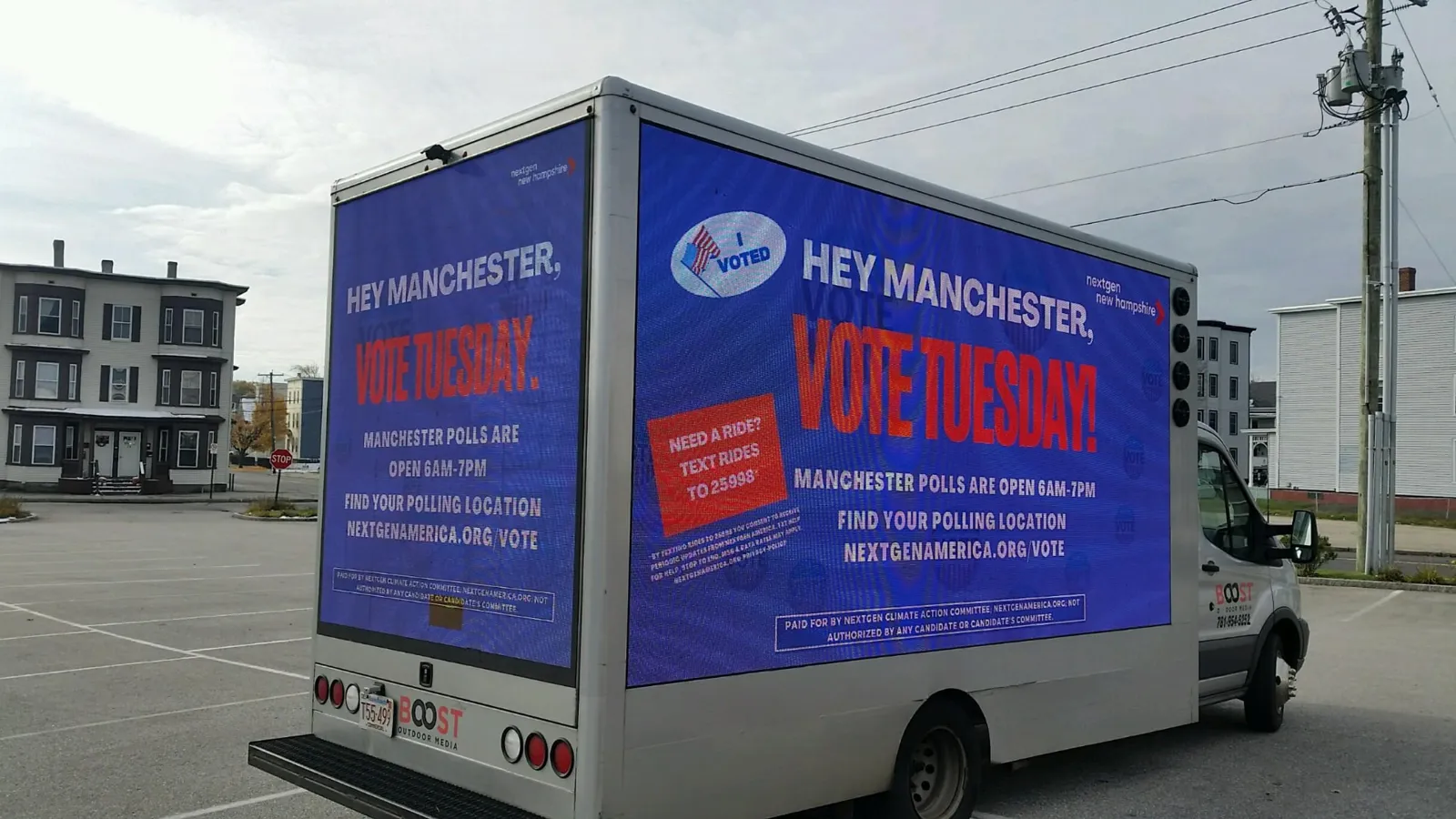 Boost Outdoor Media LED truck showing a NextGen New Hampshire 'Hey Manchester, Vote Tuesday' get-out-the-vote message in Manchester, NH