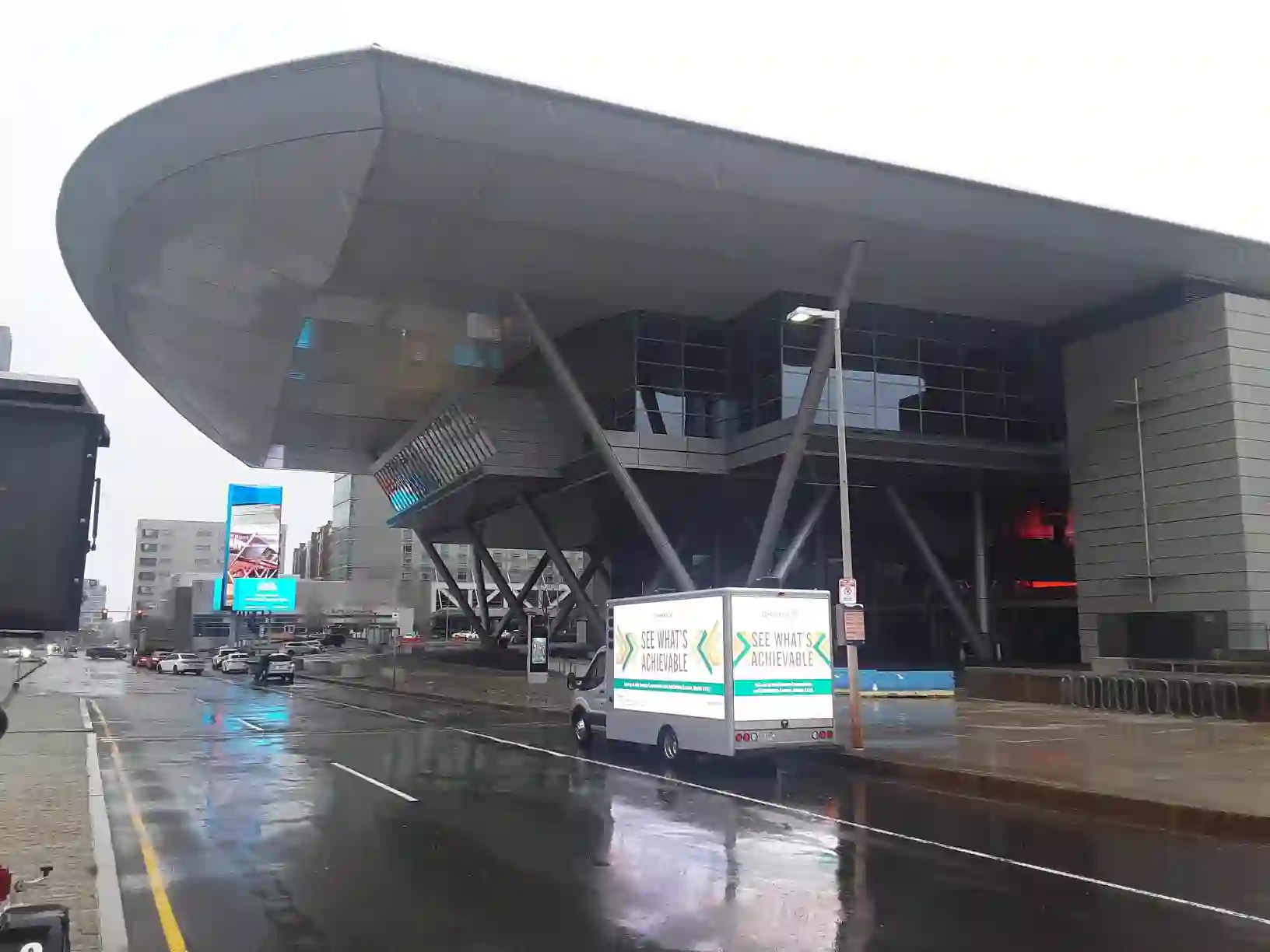 Dupixent LED billboard truck driving past the Boston Convention and Exhibition Center during a 2022 medical convention