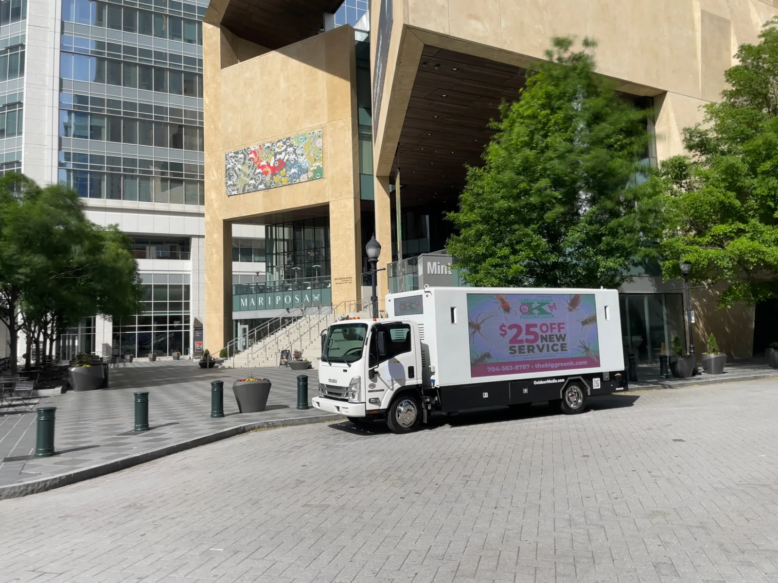 Boost Outdoor Media LED billboard truck parked outside the Mint Museum Uptown in Charlotte, North Carolina