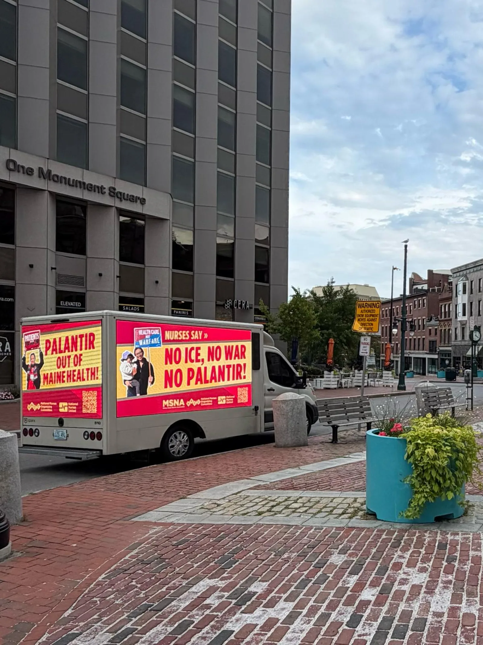 Mobile LED billboard truck parked at One Monument Square in downtown Portland, Maine displaying a nurses union advocacy message