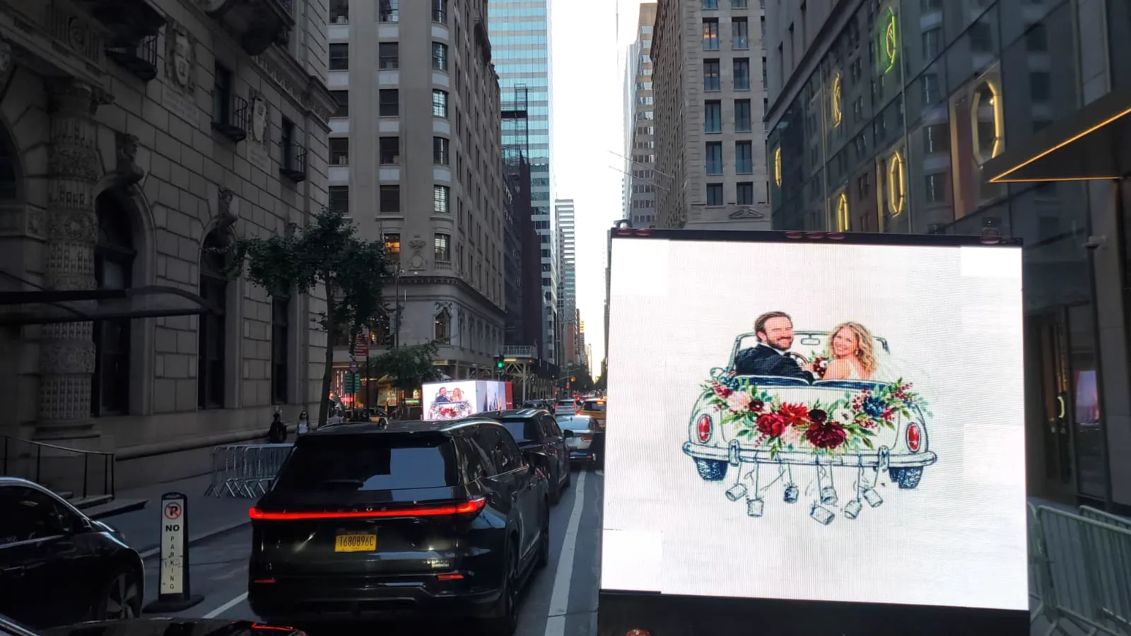 Mobile LED billboard truck displaying custom wedding artwork while traveling through Midtown Manhattan New York City