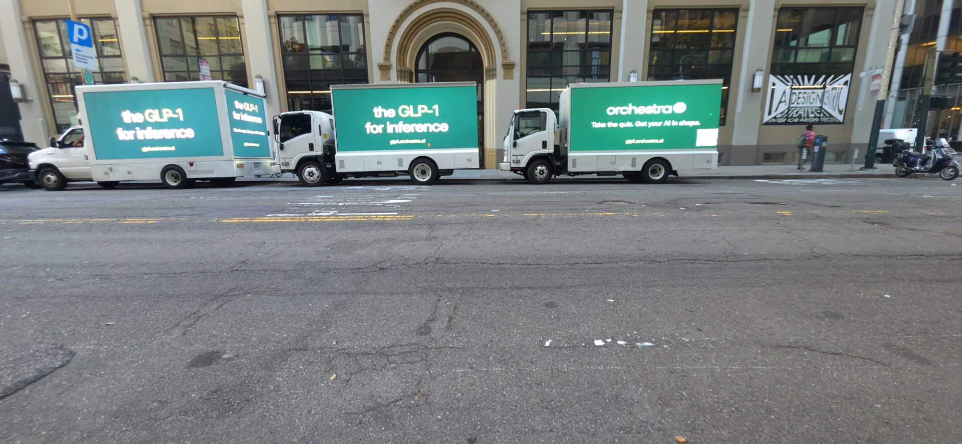 Orchestra AI LED billboard trucks in San Francisco showing the advertiser’s GLP-1 for inference headline and quiz call to action