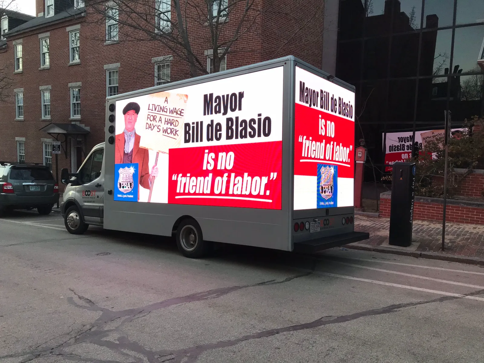 NYC PBA LED billboard truck in Manchester NH displaying Mayor Bill de Blasio is no friend of labor message