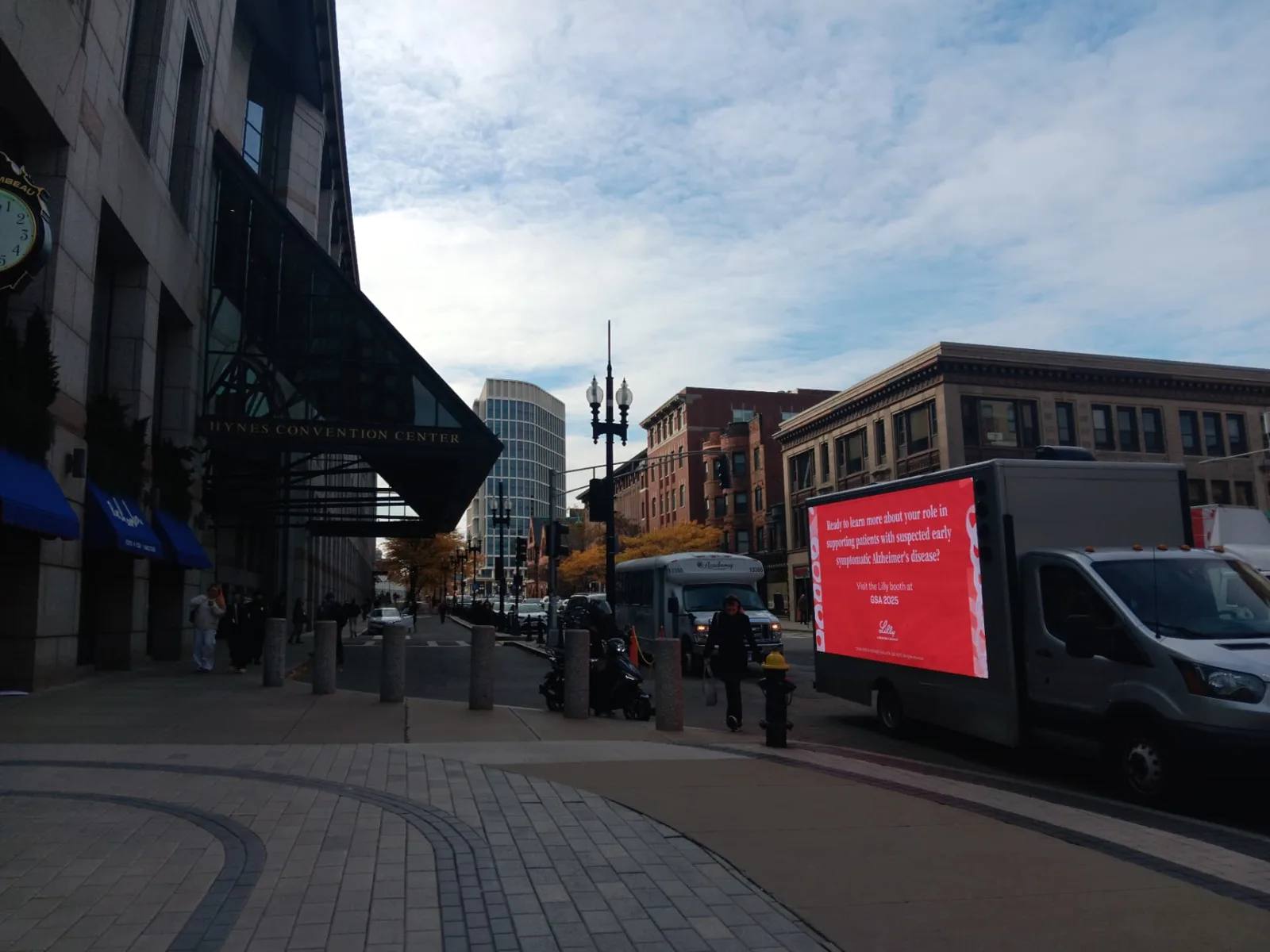 Pharmaceutical mobile billboard truck parked at the Hynes Convention Center entrance on Boylston Street, Boston