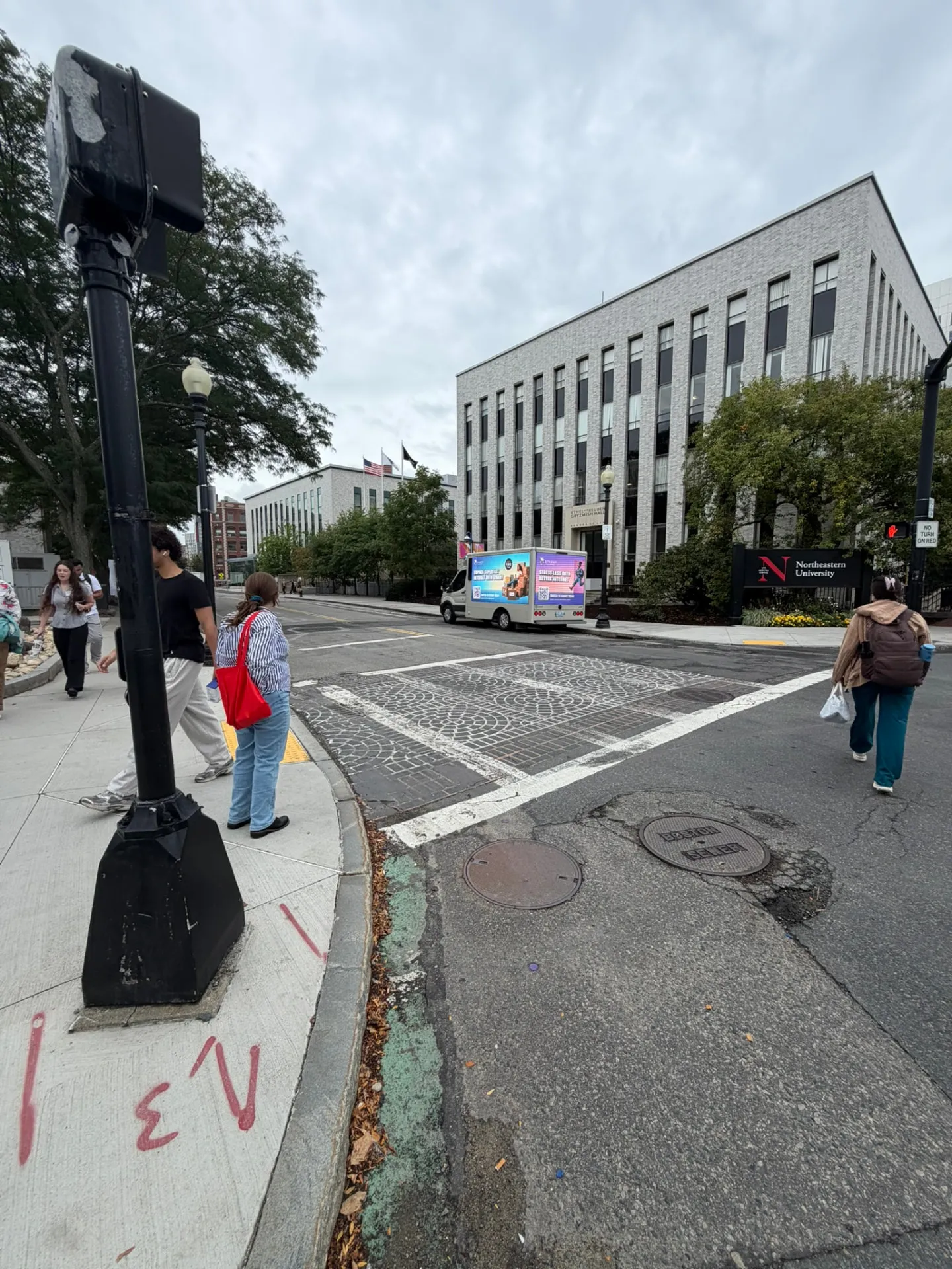 Starry LED billboard truck advertising better internet outside Northeastern University in Boston during back-to-college move-in week