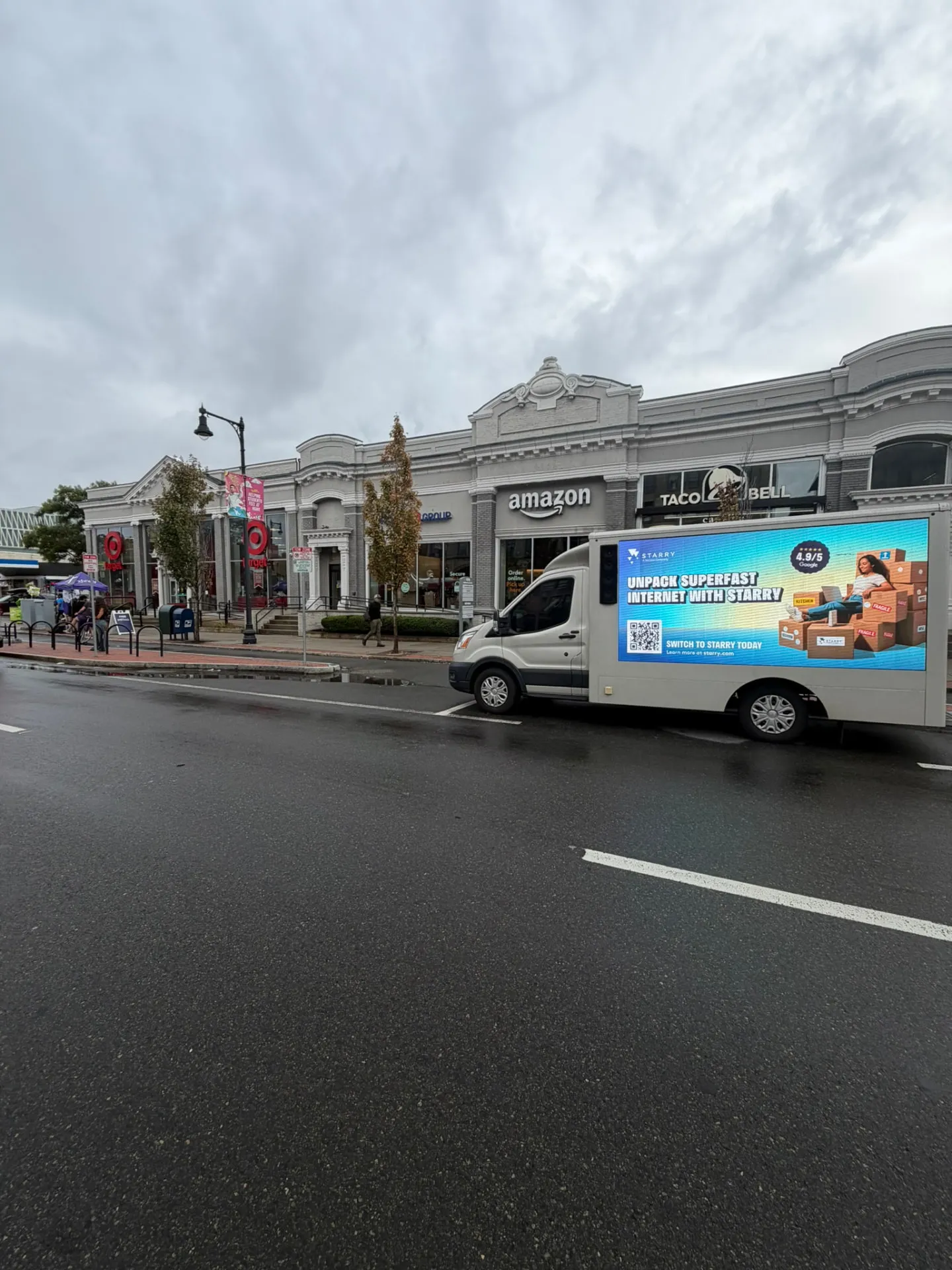 Starry LED billboard truck parked in front of the Target and Amazon stores in the Fenway neighborhood of Boston